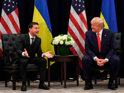 US President Donald Trump and Ukrainian President Volodymyr Zelensky speak during a meetin