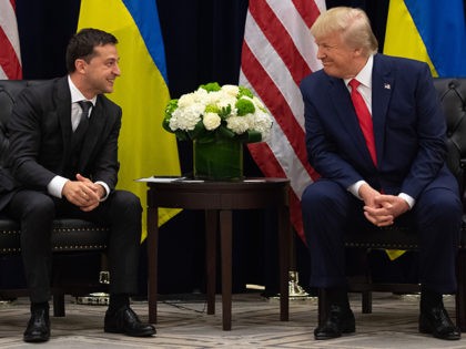 TOPSHOT - US President Donald Trump and Ukrainian President Volodymyr Zelensky speak durin