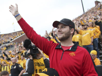 IOWA CITY, IOWA- SEPTEMBER 28: Carson King of Altoona, Iowa, waves to patients in the University of Iowa Stead Family Children's Hospital at the end of the first quarter of the match-up between the Iowa Hawkeyes and Middle Tennessee Blue Raiders September 28, 2019, in Iowa City, Iowa. King plans …