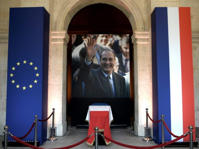 The coffin of former French President Jacques Chirac lies in state during a memorial cerem