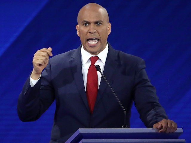 HOUSTON, TEXAS - SEPTEMBER 12: Democratic presidential candidate Sen. Cory Booker (D-NJ) speaks during the Democratic Presidential Debate at Texas Southern University's Health and PE Center on September 12, 2019 in Houston, Texas. Ten Democratic presidential hopefuls were chosen from the larger field of candidates to participate in the debate …