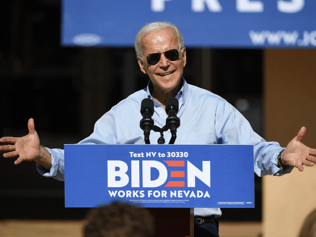 Democratic presidential candidate and former U.S. Vice President Joe Biden speaks to voter