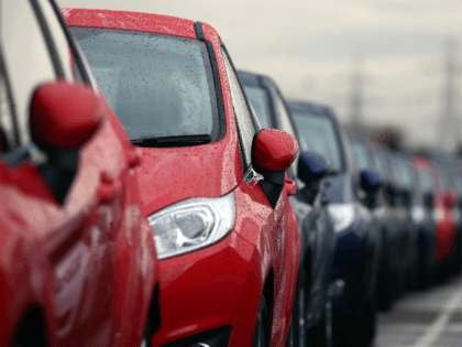 Cars are prepared for distribution at a Ford factory on January 13, 2015 in Dagenham, England. Originally opened in 1931, the Ford factory has unveiled a state of the art GBP475 million production line that will start manufacturing the new low-emission, Ford diesel engines from this November this will generate …