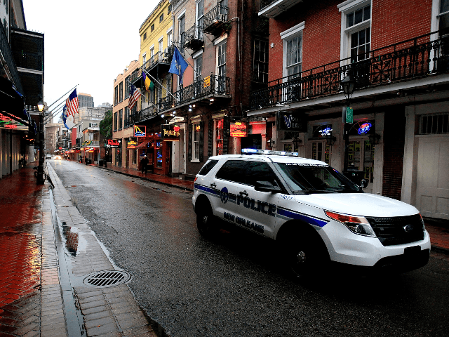 New Orleans Police patrol the French Quarter as winter weather threatens the metro area on January 28, 2014 in New Orleans, Louisiana. Due to icy conditions, many businesses and schools are closed in the metro area through Thursday. (Photo by Sean Gardner/Getty Images)