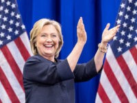 MANCHESTER, NH - SEPTEMBER 19: Democratic presidential candidate Hillary Clinton claps on stage during the New Hampshire Democratic Party Convention at the Verizon Wireless Center on September 19, 2015 in Manchester, New Hampshire. Challenger for the democratic vote Sen. Bernie Sanders (I-VT) has been gaining ground on Clinton in Iowa …