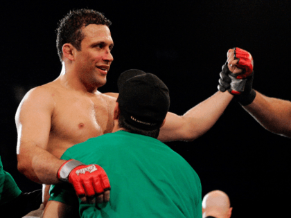 Renzo Gracie (L) celebrates defeating Carlos Newton during the International Fight League