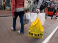 SAN FRANCISCO - DECEMBER 27: Shoppers walk in downtown San Francisco as they take advantage of the post-Christmas sales December 27, 2007 in San Francisco, California. The consumer confidence index grew in the month of December despite underlying concerns about the economy. (Photo by David Paul Morris/Getty Images)