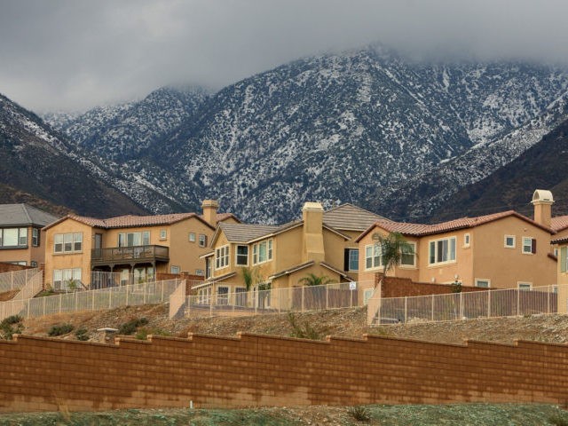 RANCHO CUCAMONGA, CA - DECEMBER 16: Storm clouds hover near recently finished homes and u