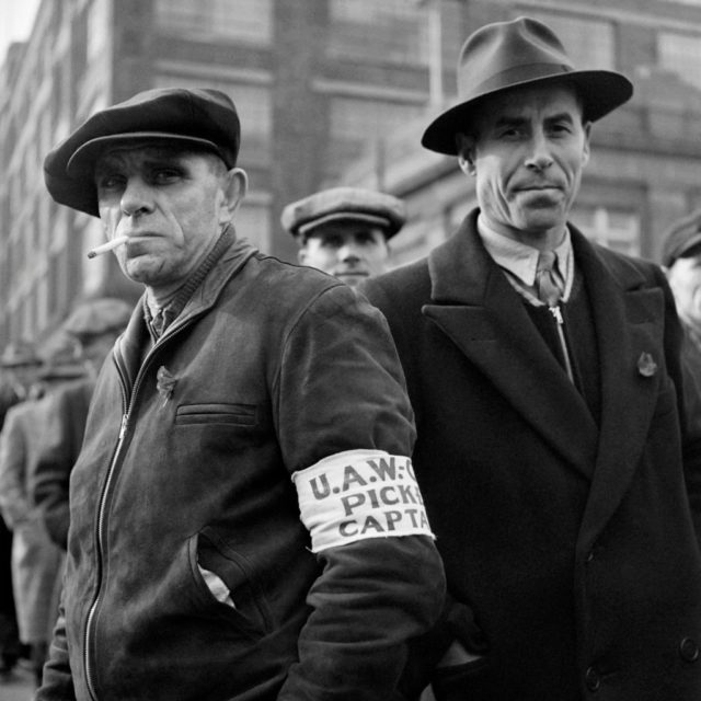 Picture taken in April 1950 of workers on strike wearing an armband of United Auto Workers (UAW), at the Ford Motor Company plant in Detroit, Michigan. / AFP PHOTO / - (Photo credit should read -/AFP/Getty Images)
