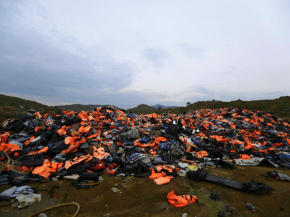 FILE - In this Thursday, March 16, 2017 file photo, piles of life jackets used by refugees