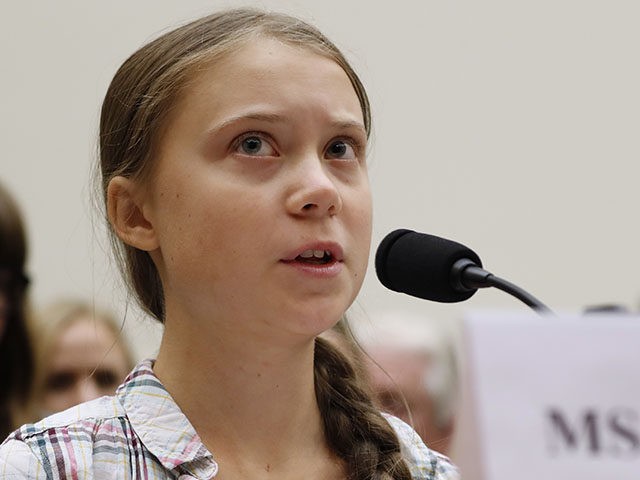 Youth climate change activist Greta Thunberg, left, speaks at a House Foreign Affairs Comm