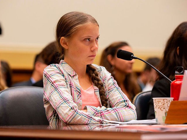 Swedish environment activist Greta Thunberg looks on during a joint hearing before the House Foreign Affairs Committee, Europe, Eurasia, Energy and the Environment Subcommittee, and the House Select Committee on the Climate Crisis, at the Rayburn House Office Building on Capitol Hill in Washington, DC, on September 18, 2019. (Photo …