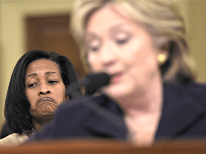 Attorney Cheryl Mills (L) listens as former Secretary of State and Democratic Presidential hopeful Hillary Clinton testifies before the House Select Committee on Benghazi on Capitol Hill in Washington, DC, October 22, 2015. Clinton took the stand Thursday to defend her role in responding to deadly attacks on the US …