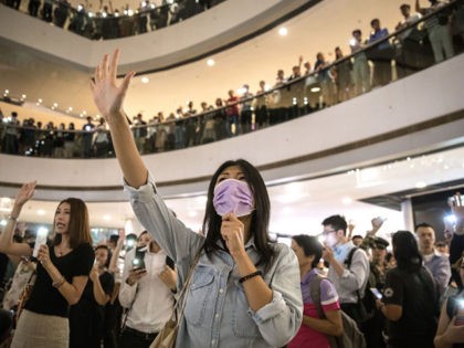HONG KONG, CHINA - SEPTEMBER 12: Protesters sing songs and shout slogans after gathering at the IFC Mall on September 12, 2019 in Hong Kong, China. Pro-democracy protesters have continued demonstrations across Hong Kong despite the withdrawal of a controversial extradition bill as demonstrators call for the city's Chief Executive …
