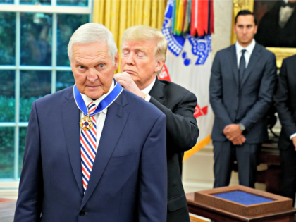 WASHINGTON, DC - SEPTEMBER 05: U.S. President Donald Trump (R) gives the Presidential Medal of Freedom to National Basket Ball Hall of Fame inductee Jerry West during a ceremony in the Oval Office at the White House September 05, 2019 in Washington, DC. West played for the Los Angeles Lakers …