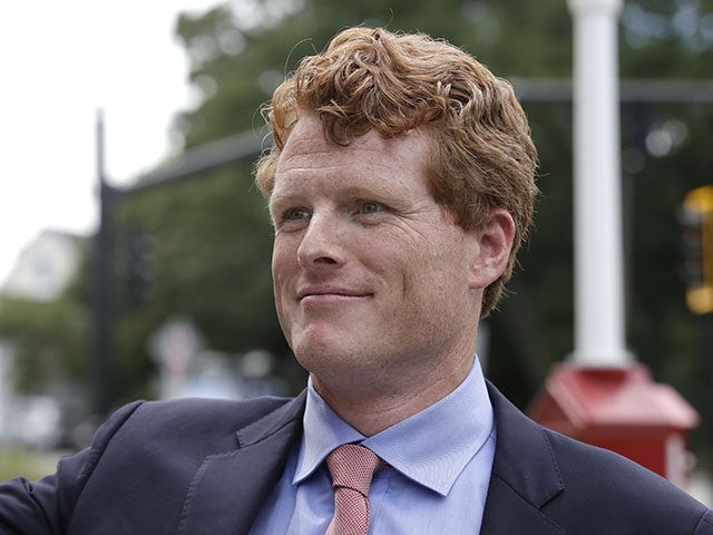 U.S. Rep. Joe Kennedy III, D-Mass., smiles after a news conference, Tuesday, Aug. 27, 2019, in Newton, Mass. Kennedy III, a scion of one of America's most storied political families, is taking steps to challenge U.S. Sen. Edward Markey, D-Mass., in the 2020 Democratic primary, setting the stage for what …