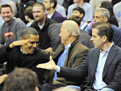 WASHINGTON - JANUARY 30: (AFP OUT) U.S. President Barack Obama (L) greets Vice President Joe Biden (C) and his son Hunter Biden as they attend the game between the Duke Blue Devils and Georgetown Hoyas on January 30, 2010 at the Verizon Center in Washington, DC. (Photo by Alexis C. …