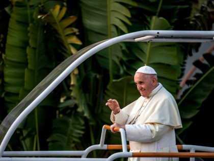 Pope Francis waves as he leaves the Ivato International Airport, in Antananarivo, Madagasc
