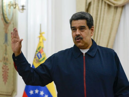 CARACAS, VENEZUELA - JULY 09: Nicolas Maduro (R) President of Venezuela speaks prior a mee