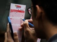 NEW YORK, NY - OCTOBER 23: Customers fill out Mega Millions lottery tickets outside of a convenience store in Lower Manhattan, October 23, 2018 in New York City. The $1.6 billion Mega Millions prize to be drawn Tuesday night is set to be the largest lottery prize in U.S. history. …