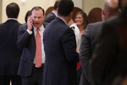 WASHINGTON, DC - JULY 18: Sen. Mike Lee (R-UT) takes a break from the weekly Senate Republican policy luncheon to talk on the phone outside the Mansfield Room at the U.S. Capitol July 18, 2017 in Washington, DC. Senate Majority Leader Mitch McConnell (R-KY) said there are not enough votes …