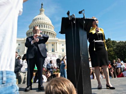 Rep. Kathy Castor, D-Fla., right, speaks as she is joined on stage by House Judiciary Committee Chairman Jerry Nadler, D-N.Y., during the Climate Strike on Friday, Sept. 20, 2019, in Washington. (AP Photo/Kevin Wolf)
