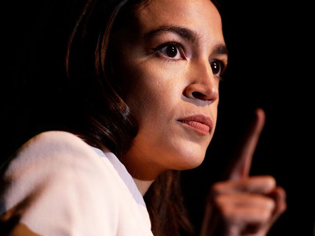 WASHINGTON, DC - MAY 13: U.S. Rep. Alexandria Ocasio-Cortez (D-NY) speaks during a rally at Howard University May 13, 2019 in Washington, DC. The Sunrise Movement held an event for the final stop of the "Road to a Green New Deal" tour to "explore what the pain of the climate …