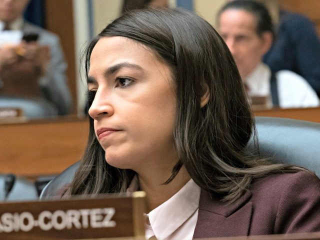 Rep. Alexandria Ocasio-Cortez, D-N.Y., attends a House Oversight Committee hearing on high
