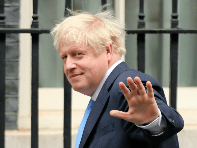 Britain's Prime Minister Boris Johnson arrives at 10 Downing Street in central London on S