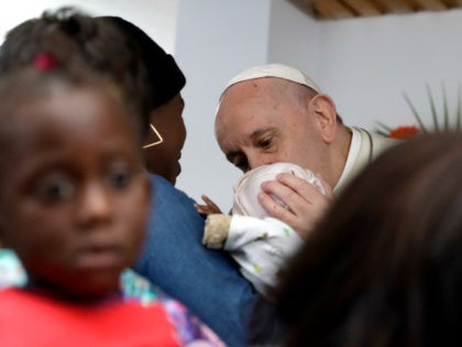 Pope Francis kisses a baby during his visit at Zimpeto Hospital, in Maputo, Mozambique, Friday, Sept. 6, 2019. Francis wrapped up his visit to Mozambique on Friday by consoling HIV-infected mothers and children at a Catholic Church-run hospital in one of the countries hardest hit by the AIDS epidemic, saying …