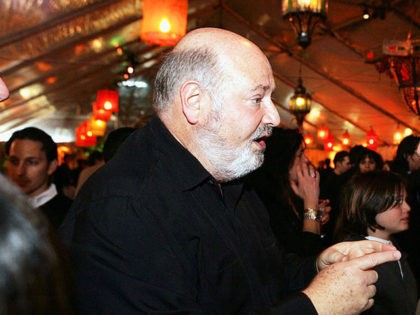 LOS ANGELES - DECEMBER 15: Director Rob Reiner (L) and producer Ben Cosgrove talk at the afterparty for the premiere of Warner Bros. Pictures' "Rumor Has It" at the Chinese Theater on December 15, 2005 in Los Angeles, California. (Photo by Kevin Winter/Getty Images)