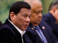BEIJING, CHINA - AUGUST 30: Philippine President Rodrigo Duterte (L) speaks to Chinese Premier Li Keqiang (not pictured) during their meeting at the Great Hall of the People on August 30, 2019 in Beijing, China. (Photo by How Hwee Young-Pool/Getty Images)