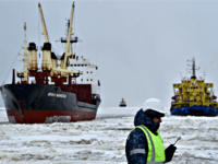 A picture taken on May 5, 2016 shows the icebreaker Tor (R) at the port of Sabetta in the Kara Sea shore line on the Yamal Peninsula in the Arctic circle, some 2450 km of Moscow. Yamal LNG -- which is set to be launched in 2017 -- is a …