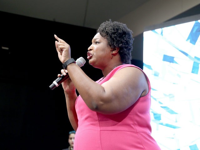 House Minority Leader for the Georgia General Assembly, Stacey Abrams speaks onstage at EM