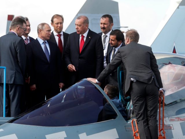 Russian President Vladimir Putin (3rd R) and his Turkish counterpart Recep Tayyip Erdogan