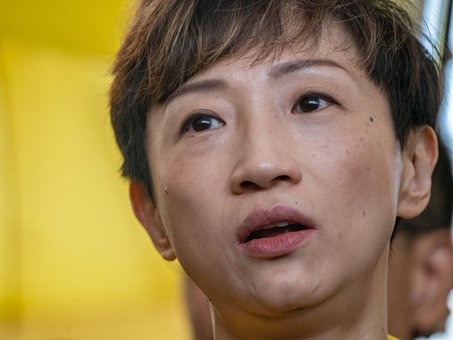 HONG KONG - APRIL 24: Pro-democracy activist Tanya Chan reacts during a press call at the