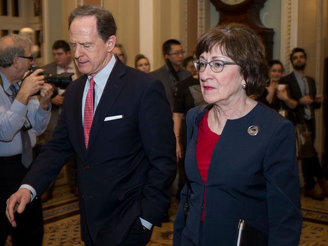 WASHINGTON, DC - JANUARY 24: Sen. Patrick Toomey (R-PA), left, and Sen. Susan Collins (R-ME), right, walk to the Senate Chamber on Capitol Hill, January 24, 2019 at the U.S. Capitol in Washington, DC. The Senate has failed to pass two procedural votes, one proposed by Republicans and the other …