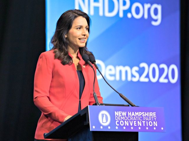 MANCHESTER, NH - SEPTEMBER 07: Democratic presidential candidate Rep. Tulsi Gabbard (D-HI) speaks during the New Hampshire Democratic Party Convention at the SNHU Arena on September 7, 2019 in Manchester, New Hampshire. Nineteen presidential candidates will be attending the New Hampshire Democratic Party convention for the state's first cattle call …