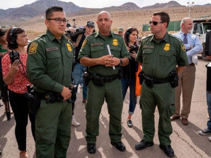 Customs and Border Protection officers give the media a tour of the new temporary migrant tent facility in El Paso, Texas, on May 2, 2019. - The facility is meant to address the record number of families and children apprehended crossing the US-Mexico border, and has shower, laundry and medical …