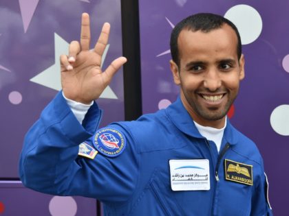 Member of the main crew to the International Space Station (ISS) United Arab Emirates' astronaut Hazza Al Mansouri waves to people as he leaves his hotel for a pre-launch preparation at the Russian-leased Baikonur cosmodrome in Kazakhstan on September 25, 2019. - Al Mansouri will make history by becoming the …