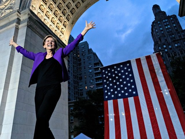 Democratic presidential candidate U.S. Sen. Elizabeth Warren takes the stage before addres