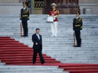 China's President Xi Jinping (bottom) attends a welcoming ceremony for Colombia's President Ivan Duque (not pictured) outside the Great Hall of the People in Beijing on July 31, 2019. (Photo by WANG ZHAO / AFP) (Photo credit should read WANG ZHAO/AFP/Getty Images)