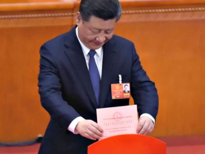 Xi-Jinping-casts-vote-to end term limits