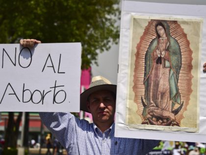 Mexican activists protest demanding the abolition of the law that allows to abort in the Mexican capital, on April 25, 2015 in Mexico City. AFP PHOTO/RONALDO SCHEMIDT (Photo credit should read RONALDO SCHEMIDT/AFP/Getty Images)