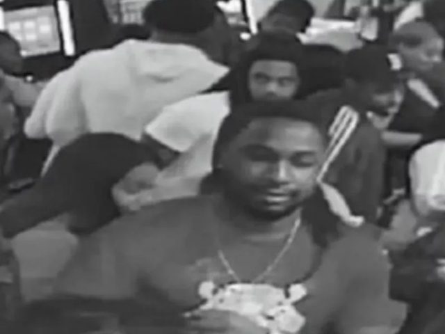 Police have released a photo of a man they say hit another man in the head with a bowling