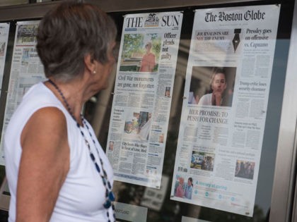 The front page of the Boston Globe August 16, 2018 edition is on display outside the Newseum in Washington DC on August 16,2018. - US newspapers big and small hit back Thursday at Donald Trump's relentless attacks on the news media with a coordinated campaign of editorials, triggering a fresh …