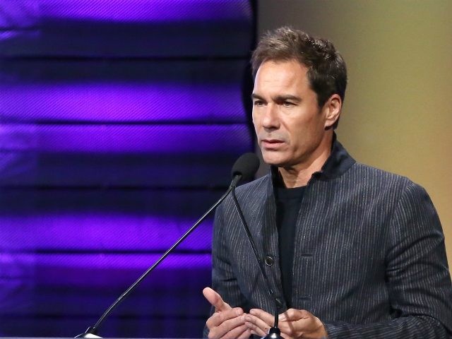 BEVERLY HILLS, CA - OCTOBER 13: Point Impact Award Honoree Eric McCormack speaks onstage a