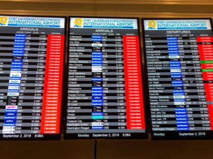 The information board displays all the cancelled flights at the Fort Lauderdale International airport ahead of the arrival of hurricane Dorian at ForT Lauderdale, Florida on September 2, 2019. - Hurricane Dorian battered the Bahamas with ferocious wind and rain, the monstrous Category 5 storm wrecking towns and homes as …