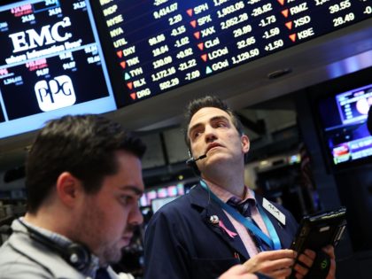 NEW YORK, NY - FEBRUARY 02: Traders work on the floor of the New York Stock Exchange (NYSE) on February 2, 2016 in New York City. The Dow Jones industrial average fell nearly 300 points today on renewed fears over the health of the global economy and another fall in …