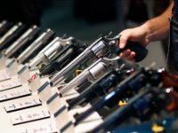 In this Jan. 19, 2016 file photo, handguns are displayed at the Smith & Wesson booth at the Shooting, Hunting and Outdoor Trade Show in Las Vegas. Backers of an expanded gun background check ballot measure approved by Nevada voters in 2016 are arguing that the Nevada governor and attorney …